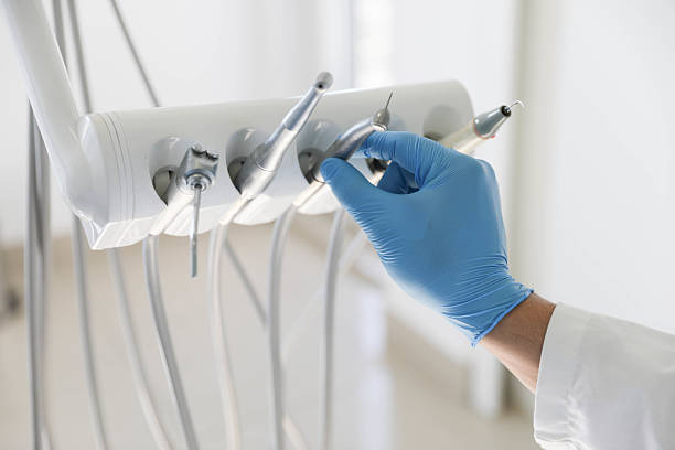 Professional Tooth Extraction technician working in Burke, VA